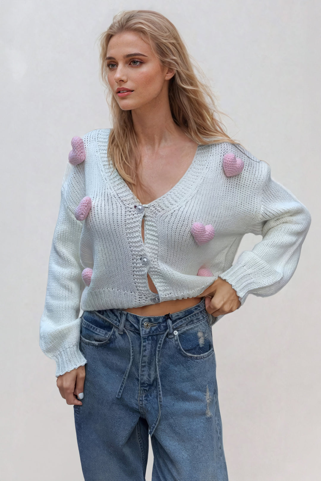 Puro- Cardigan corto in maglia con cuori in 3D